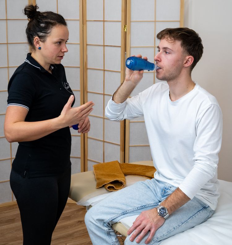 Fyzioterapeut s pacientom